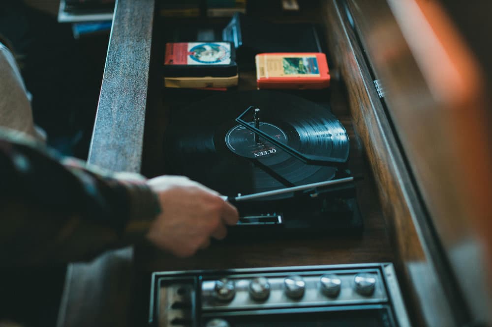 a man plays a hardcore techno record