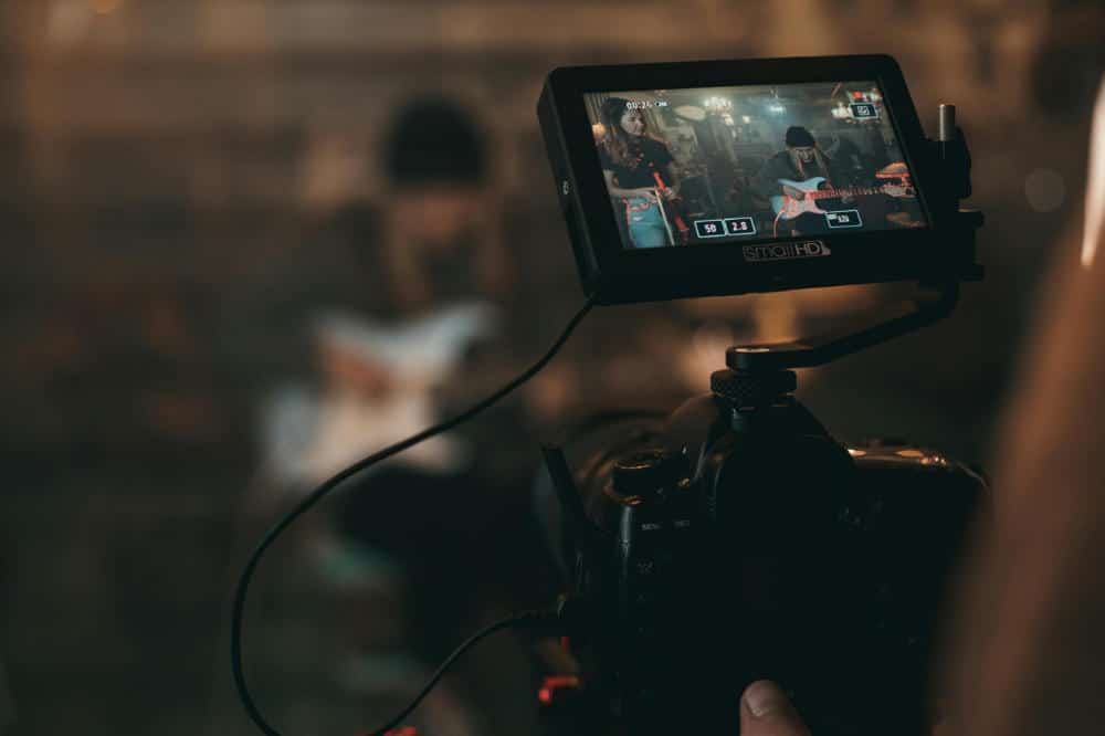 a music video is recorded with a reflex camera