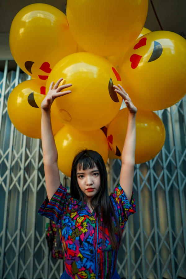 asian rave girl with colorful top