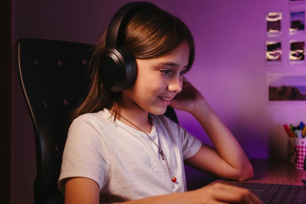 girl with headphones making music